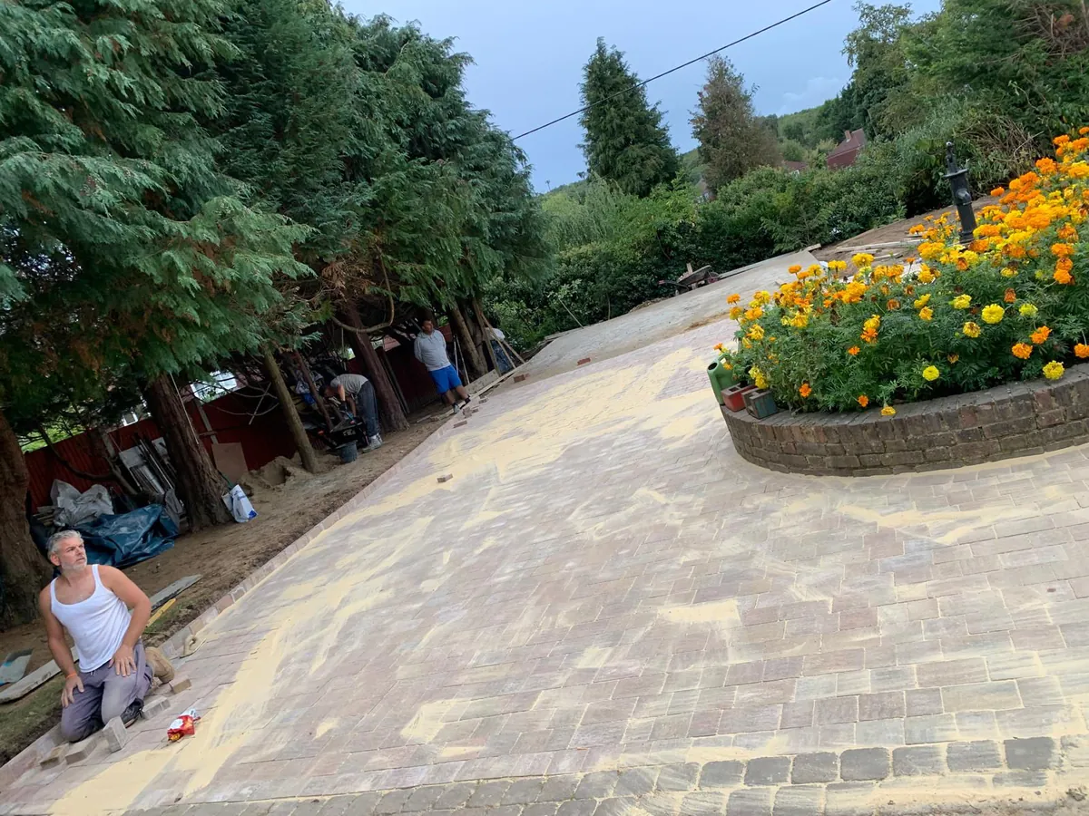 Southridge team laying block paving on a sweeping driveway