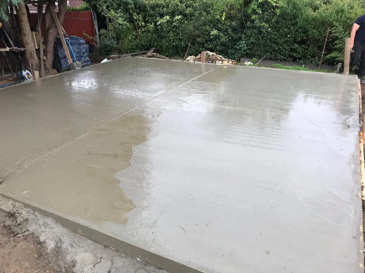 Freshly poured concrete slab with a wet finish